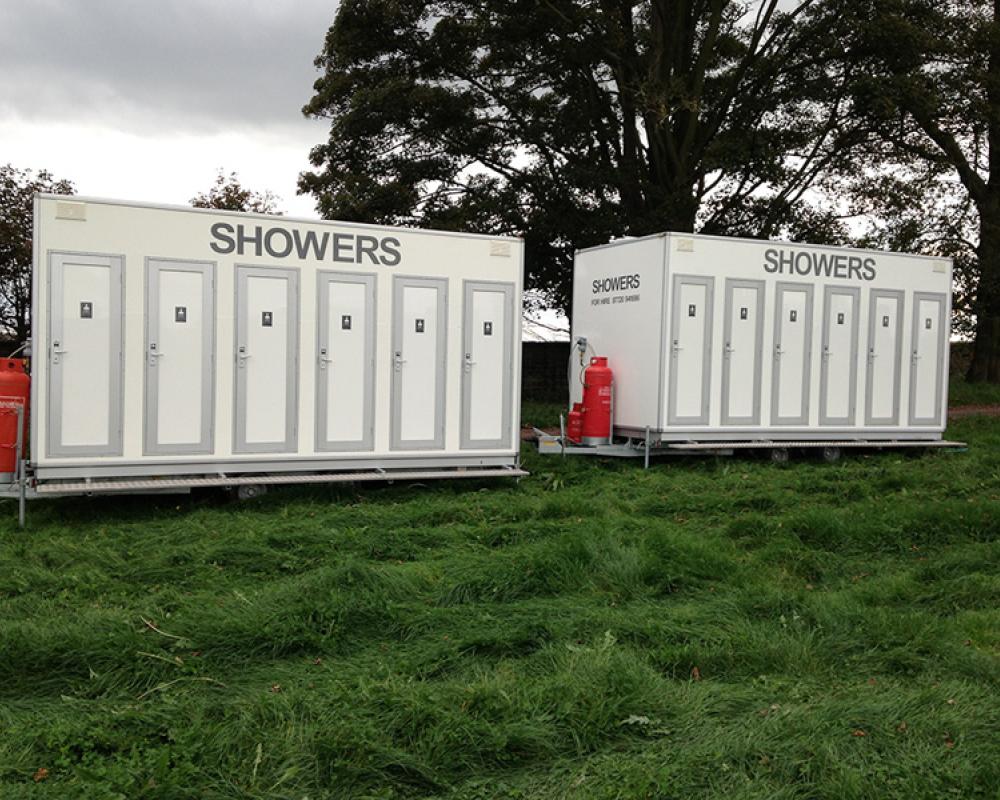 6-Bay Shower Units | Blue Loos Event Hire | Cheshire
