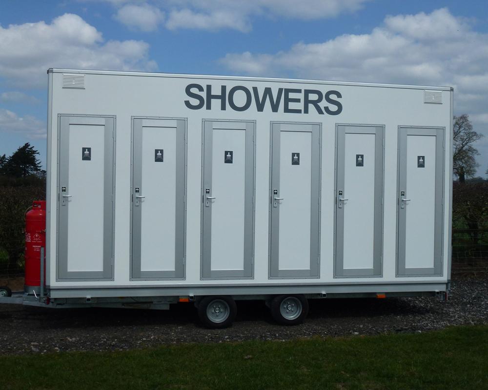 6-Bay Shower Units | Blue Loos Event Hire | Cheshire