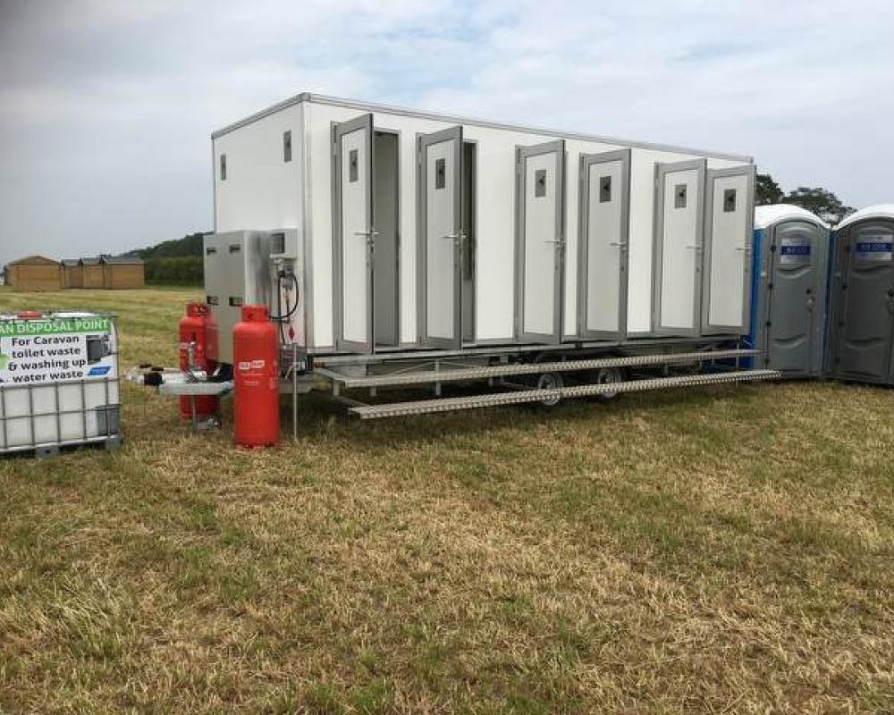 12-Bay Shower Units | Blue Loos Event Hire | Cheshire