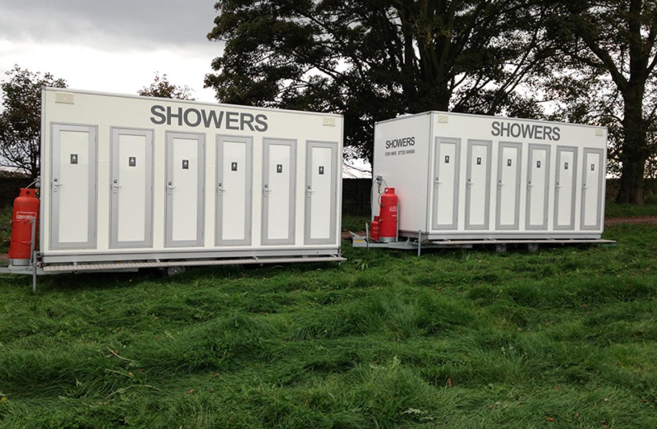 6-Bay Shower Units | Blue Loos Event Hire | Cheshire