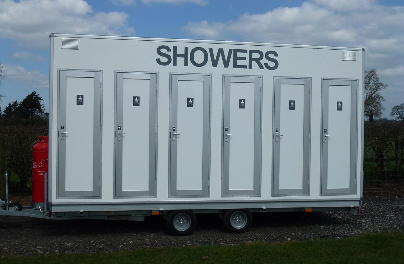 6-Bay Shower Units | Blue Loos Event Hire | Cheshire