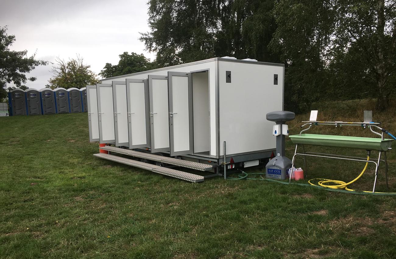 6-Bay Shower Units | Blue Loos Event Hire | Cheshire